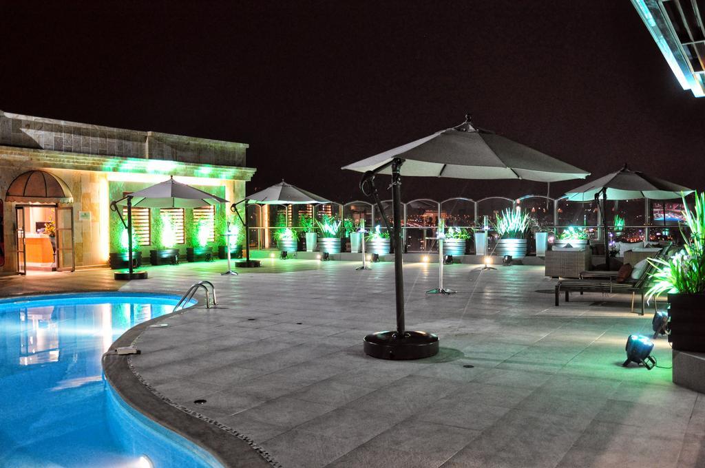 Hotel Dann Carlton בוקארמנגה מראה חיצוני תמונה The pool at the rooftop